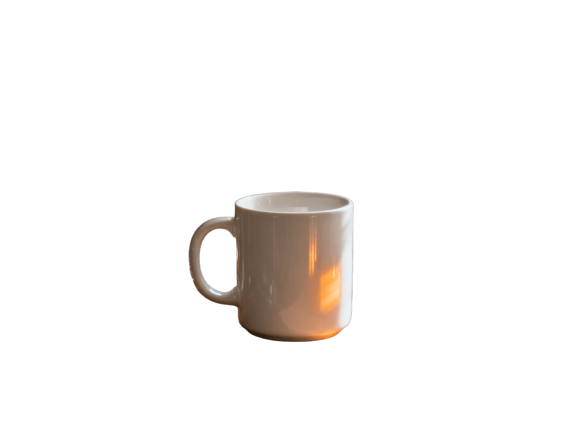 Background remover before and after: a ceramic mug cut out of a cluttered kitchen counter — after Background remover before and after: a ceramic mug cut out of a cluttered kitchen counter — after